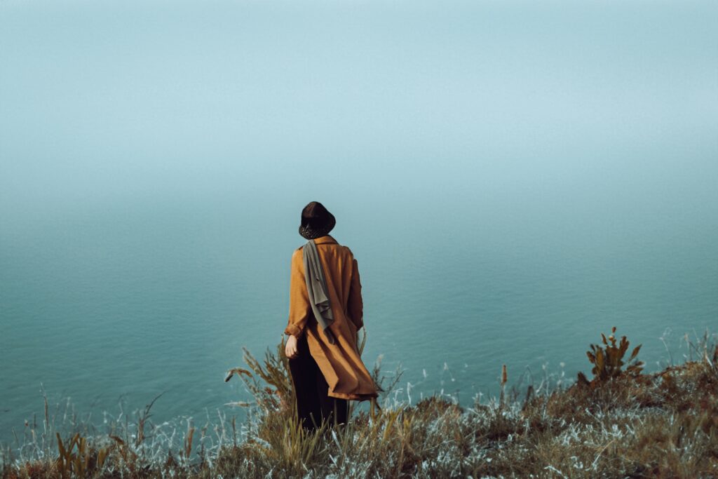 Woman looking into the sea by Ivona Curcija